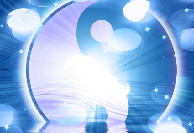 Yin yang symbol on a soft blue background